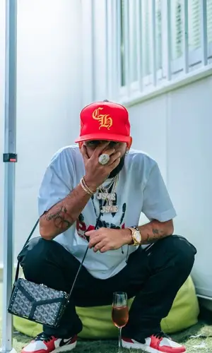 Arcangel wearing Chrome Hearts cap