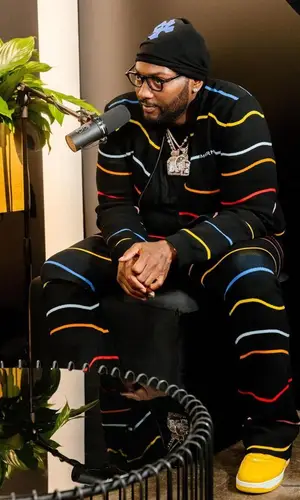 Peezy wearing Marni trousers