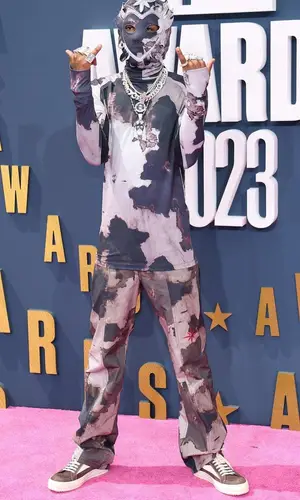 Rich The Kid wearing Kusikohc pants