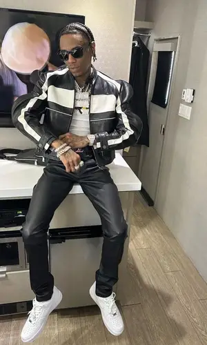 Soulja Boy wearing Purple Brand pants