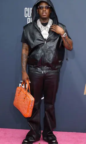 Real Boston Richey wearing Cout De La Liberte pants