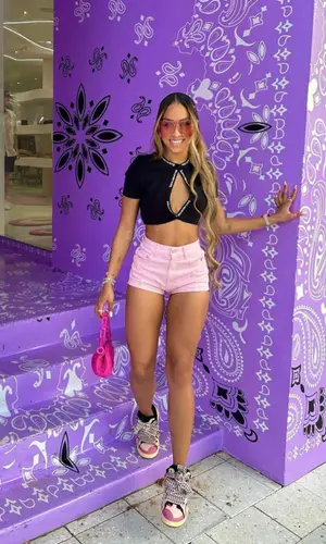 Jilly Anais wearing Lanvin Buttoned sneakers
