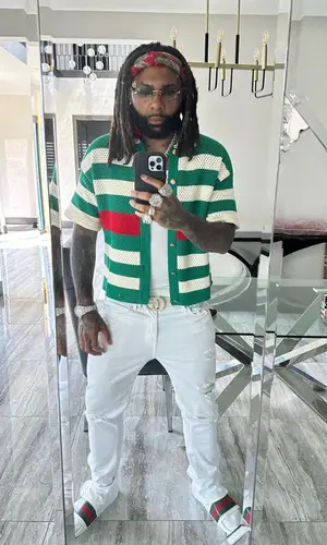 Money Man wearing Gucci shirt