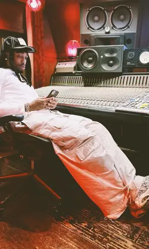 Quavo wearing True Religion cap