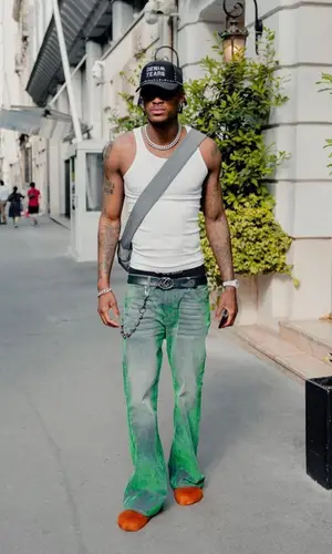 Jarred Vanderbilt’s Outfit in Bottega Veneta Bag, Denim Tears Cap & Marni Sandals (2023)
