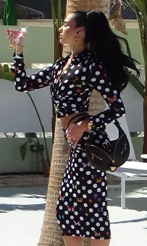 Dua Lipa’s Outfit in Versace Bag (2023)