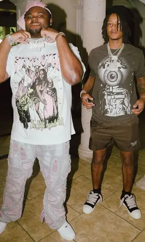 Tee Grizzley wearing Who Decides War bag
