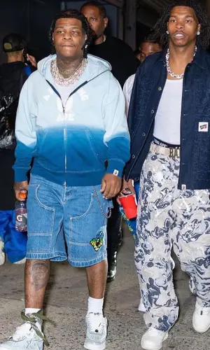 Rylo Rodriguez wearing Bape shorts