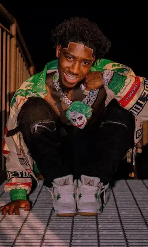 2Rare wearing BooHooMan jacket