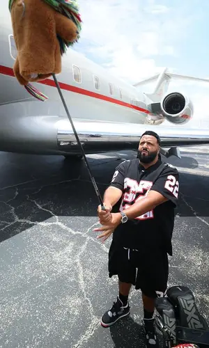 DJ Khaled wearing Amiri t-shirt