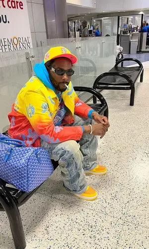 Peezy wearing Versace eyewear