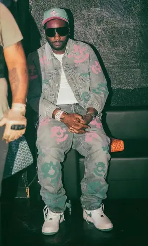 Peezy wearing Rick Owens eyewear