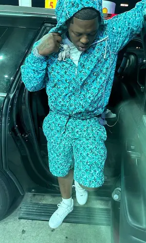 Lil Zay Osama’s Outfit in Louis Vuitton Jacket & Nike Sneakers (2023)
