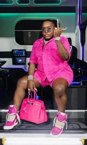Saucy Santana’s Outfit in Marine Serre Shirt, Rick Owens Sneakers & Cartier Eyewear (2023)