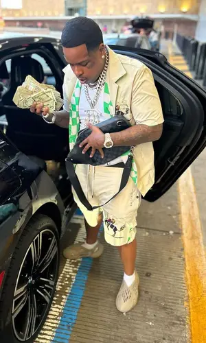 Finesse2tymes wearing Vieriche shirt