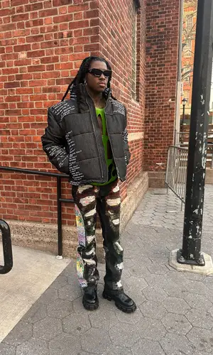 SahBabii wearing Prada eyewear