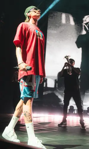 Peso Pluma’s Outfit in Supreme T-Shirt & Nike Socks (2023)
