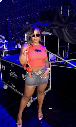 Reginae Carter wearing Diesel top