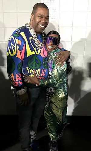 Busta Rhymes’ Outfit in Loewe Sweatshirt, Purple Brand Jeans & Nike Sneakers (2023)