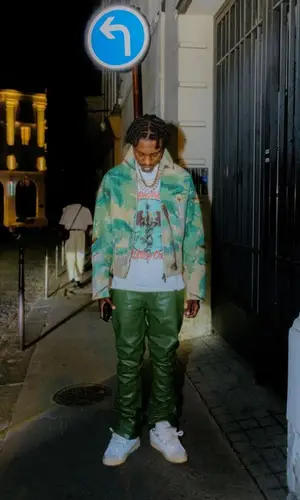 Lil Tjay wearing Emporio Armani jacket