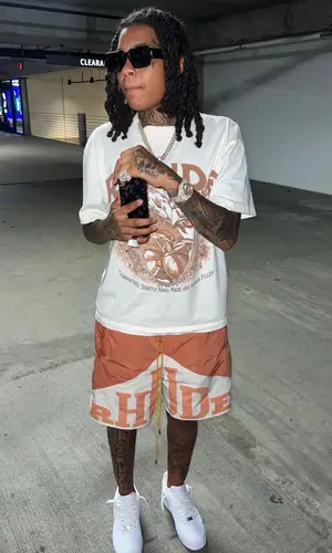 Young M.A’s Outfit in Rhude T-Shirt & Nike Sneakers (2023)
