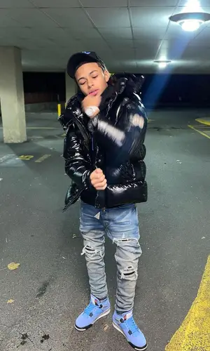 DD Osama wearing Amiri hat