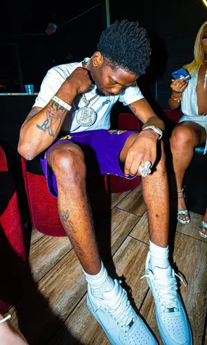 BlocBoy JB’s Outfit in Supreme T-Shirt, Awful Lot of Cough Syrup Shorts & Nike Sneakers (2023)
