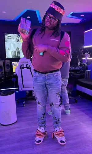 Lucki wearing Chrome Hearts sweater