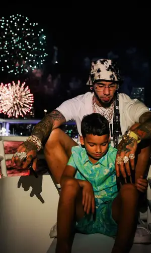 Anuel AA wearing Amiri t-shirt