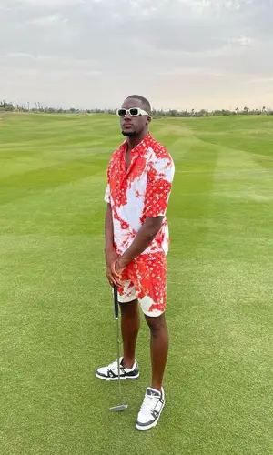 Ibrahima Konate wearing Louis Vuitton shirt