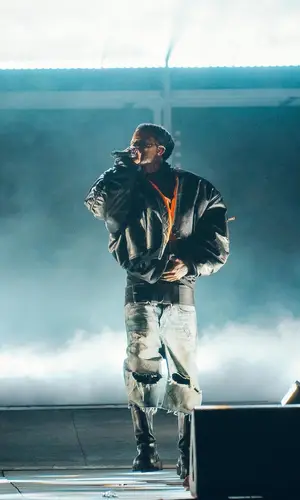 Playboi Carti wearing Balenciaga belt