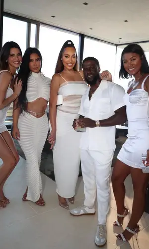 Kim Kardashian’s Outfit in Alaïa T-Shirt & Rene Caovilla Sandals (2023)