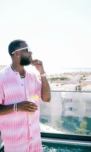 Gucci Mane’s Outfit in GCDS Shirt, Amiri Sneakers & Maison Margiela Eyewear (2023)