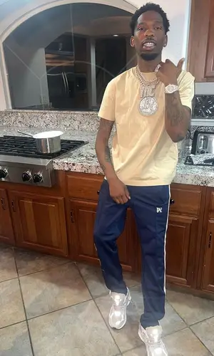 BlocBoy JB’s Outfit in Fear of God T-Shirt, Palm Angels Pants & New Balance Sneakers (2023)