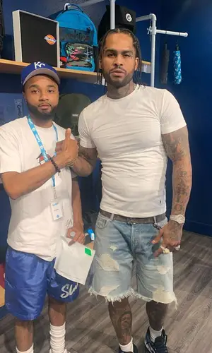 Dave East wearing Polo Ralph Lauren t-shirt