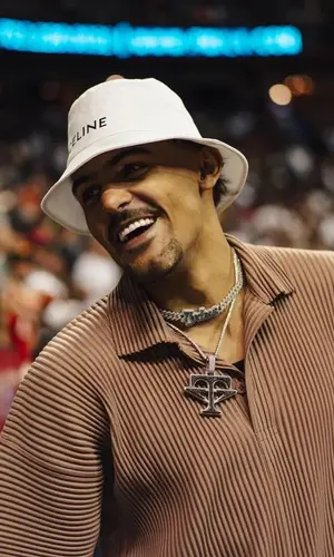 Trae Young wearing Issey Miyake pants