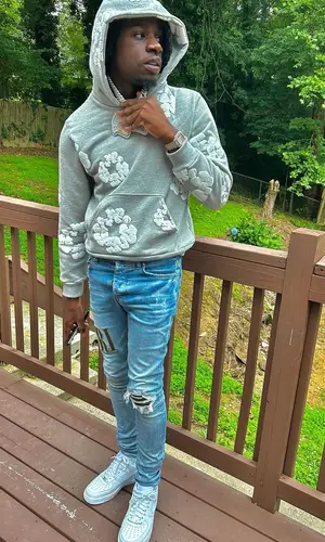 SleazyWorld Go wearing Denim Tears hoody