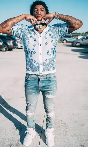 Yungeen Ace wearing Amiri shirt