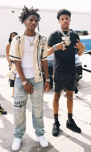 Lil Darius wearing Amiri shirt
