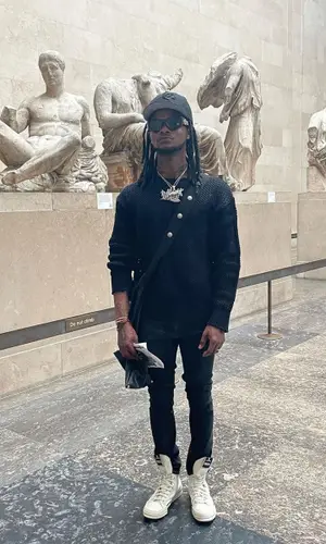 BigBabyGucci’s Outfit in Rick Owens Jeans, Converse Sneakers & Saintwoods Cap (2023)