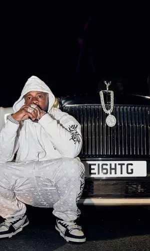 Yo Gotti’s Outfit in Chrome Hearts Hoodie & Louis Vuitton Sneakers (2023)