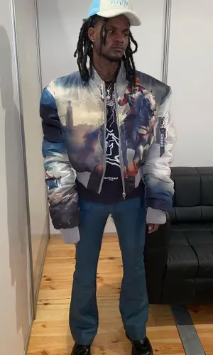 BigBabyGucci’s Outfit in Cactus Jack T-Shirt, Dr. Martens Boots & Mastermind (2023)