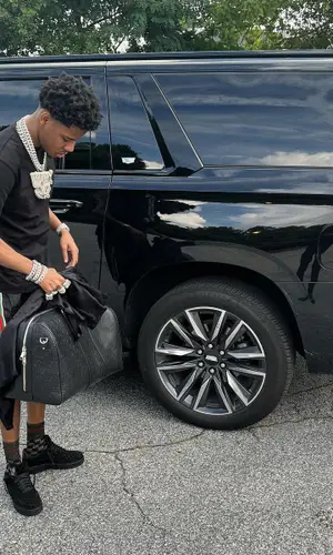 Nardo Wick wearing Gucci sock