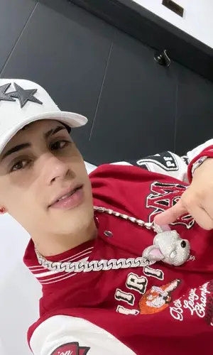 Cris MJ wearing Amiri jacket