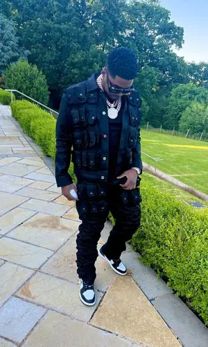 Skiibii wearing Marc Jacques Burton jacket