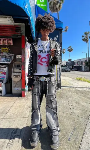 Trent Madison wearing Givenchy jewelry