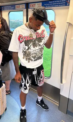 Funny Mike wearing Crucified Studios sock