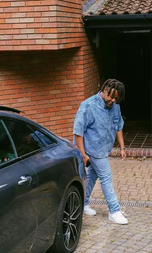 Bnxn wearing Calvin Klein shirt
