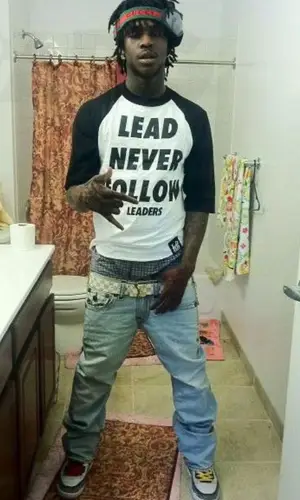 Chief Keef’s Outfit in Custom Shirt, Louis Vuitton Belt & Gucci Eyewear (2012)