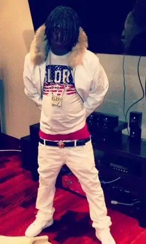 Chief Keef wearing Versace belt